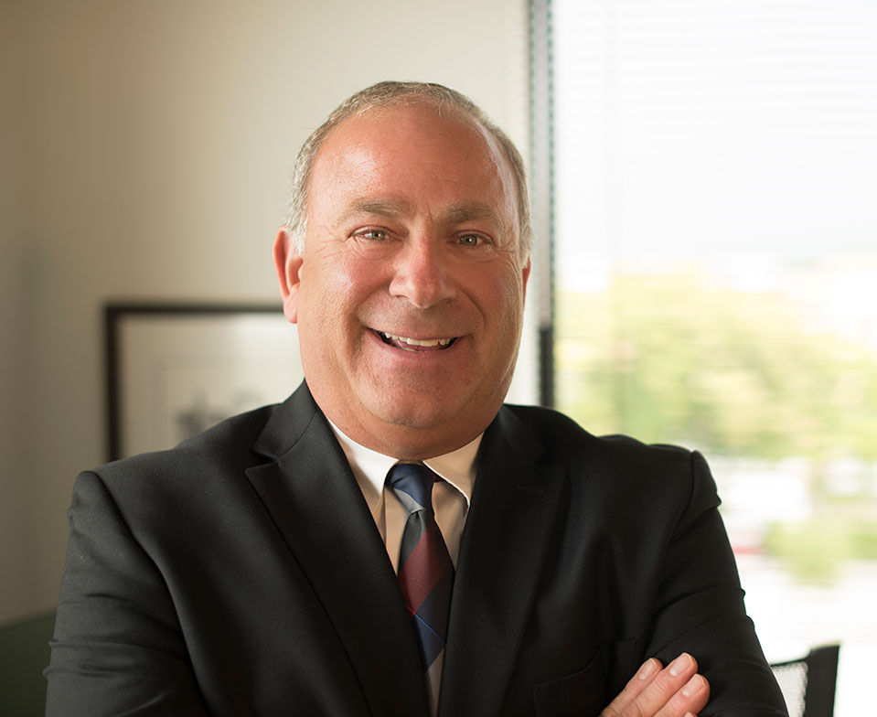 A headshot of Bruce Bodor, insurance claim expert
